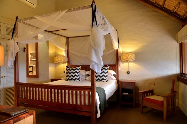 Victoria falls safari lodge interior bedroom.